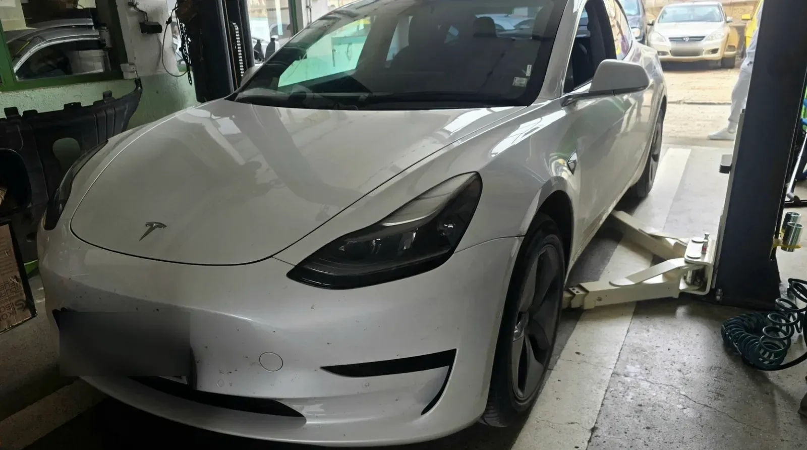 Tesla лого